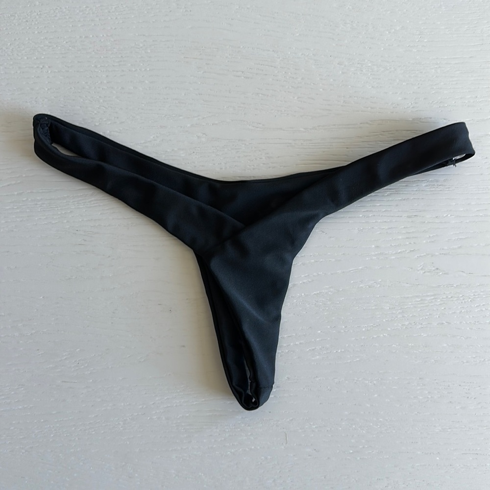 Very sexy black bikini bottom. Cheeky. Small